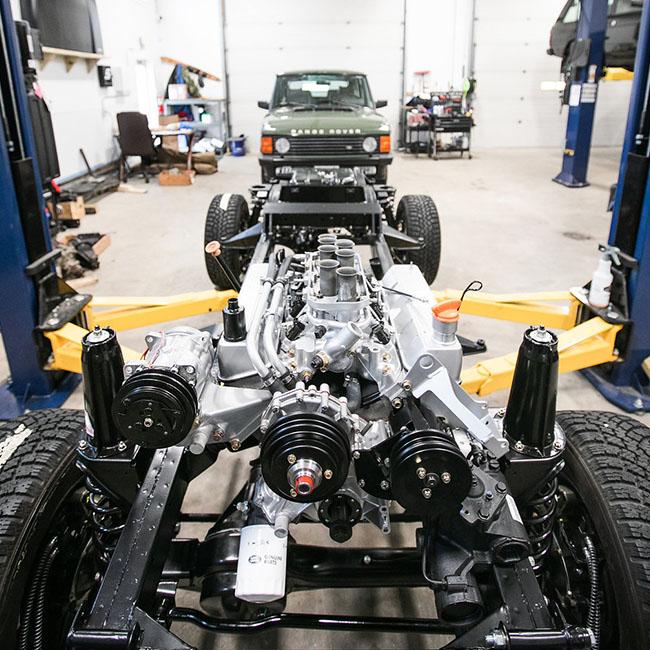 Range Rover Classic rolling chassis with an engine and drivetrain on lift